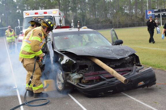 fire rescue and first responders perform a mock DUI accident