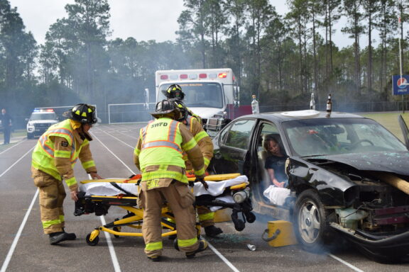 fire rescue and first responders perform a mock DUI accident