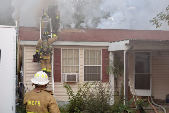 Firefighters battle house fire in Freeport, FL