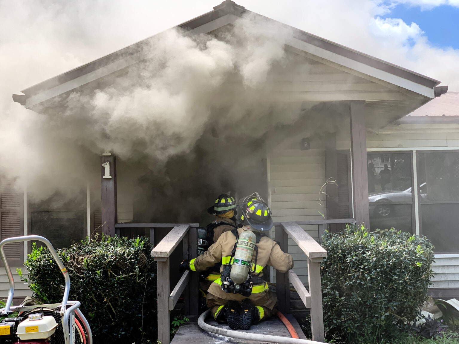 FISHERMEN SPOT HOUSE ON FIRE IN DEFUNIAK SPRINGS; FIREFIGHTERS RUSH TO