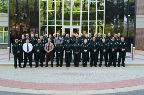 FSA Commanders Academy Graduates pose for a photo outside Florida Sheriffs Association in Tallahassee