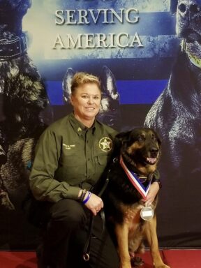 K9 Kayne and Sergeant Kristin Pond pose at the USPCA National K9 Trials in Albany, New York