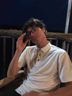 Teen Boy with brown hair and glasses