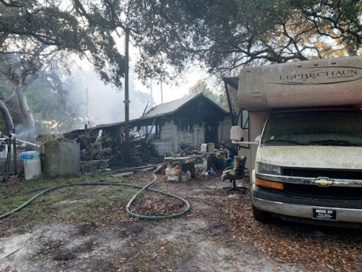 Travel Trailer Sitting Next to House Involved in Structure Fire