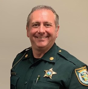 Major Audie Rowell smiling in Class-A uniform