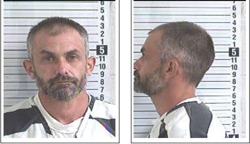 Side-by-side mug shots of a white male with salt and pepper hair and facial hair. He is wearing a black and white stripped inmate uniform.