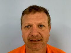 Mug shot of a white male with brown hair