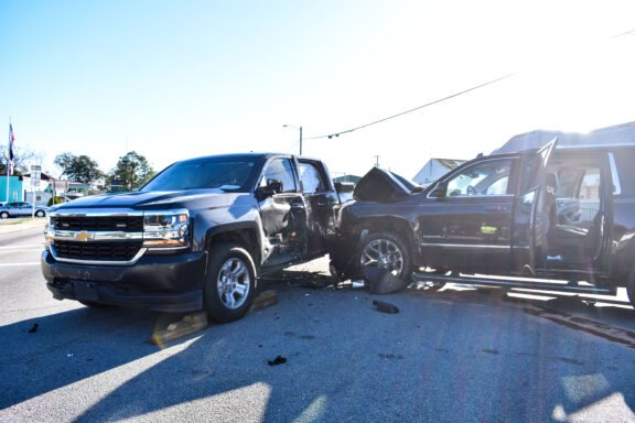 A traffic crash where an SUV slammed into a pick-up truck. 