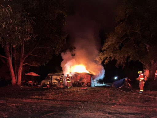 Guest house on fire at night