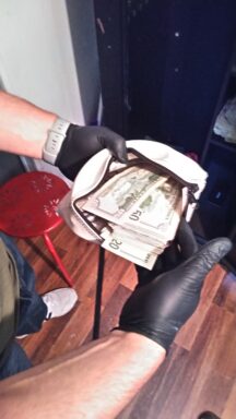Cash inside a bank pouch