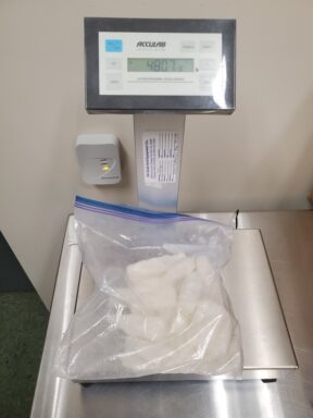 white substance in plastic bag on a scale