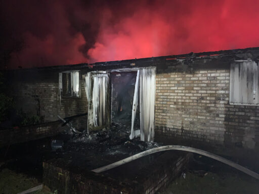 Outside of damaged home after structure fire