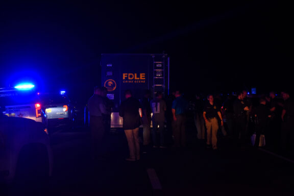 FDLE and law enforcement members walking on the interstate