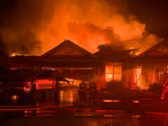 Large brick house on fire