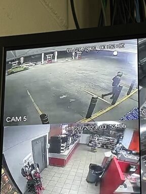 A double frame of a gas station parking lot on the top of the window and the inside of a gas station on the bottom. Surveillance videa.