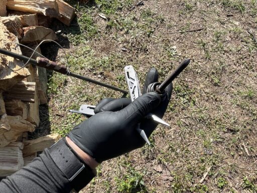 A picture of a deputy holding a homemade firing pin.