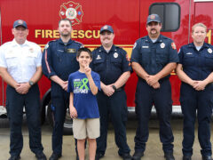 YOUNG BOY REUNITES WITH FIRST RESPONDERS WHO SAVED HIS LIFE