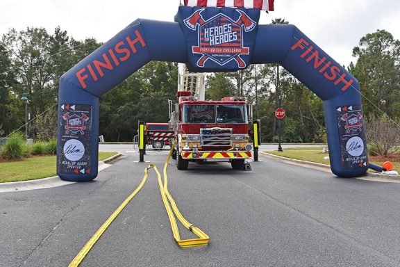 Finish Line blow up in front of fire engine