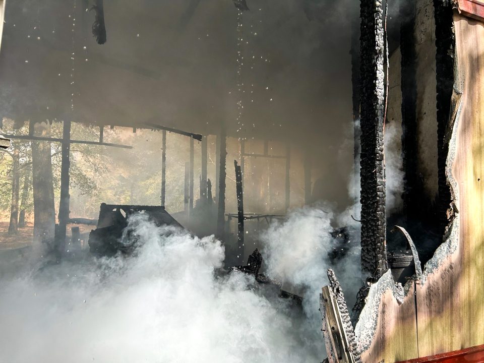 The inside of a mobile home filled with smoke after a structure fire